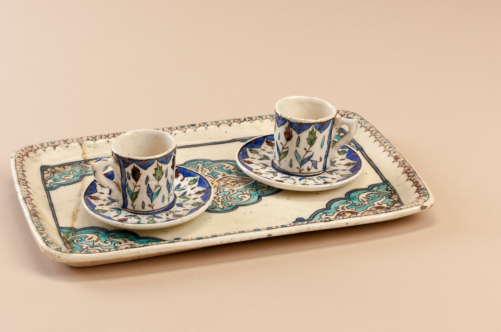 Two Turkish coffee cups from "Kütahya Tiles and Ceramics" exhibition at Pera Museum, Istanbul, Türkiye. (Photo courtesy of Pera Museum)