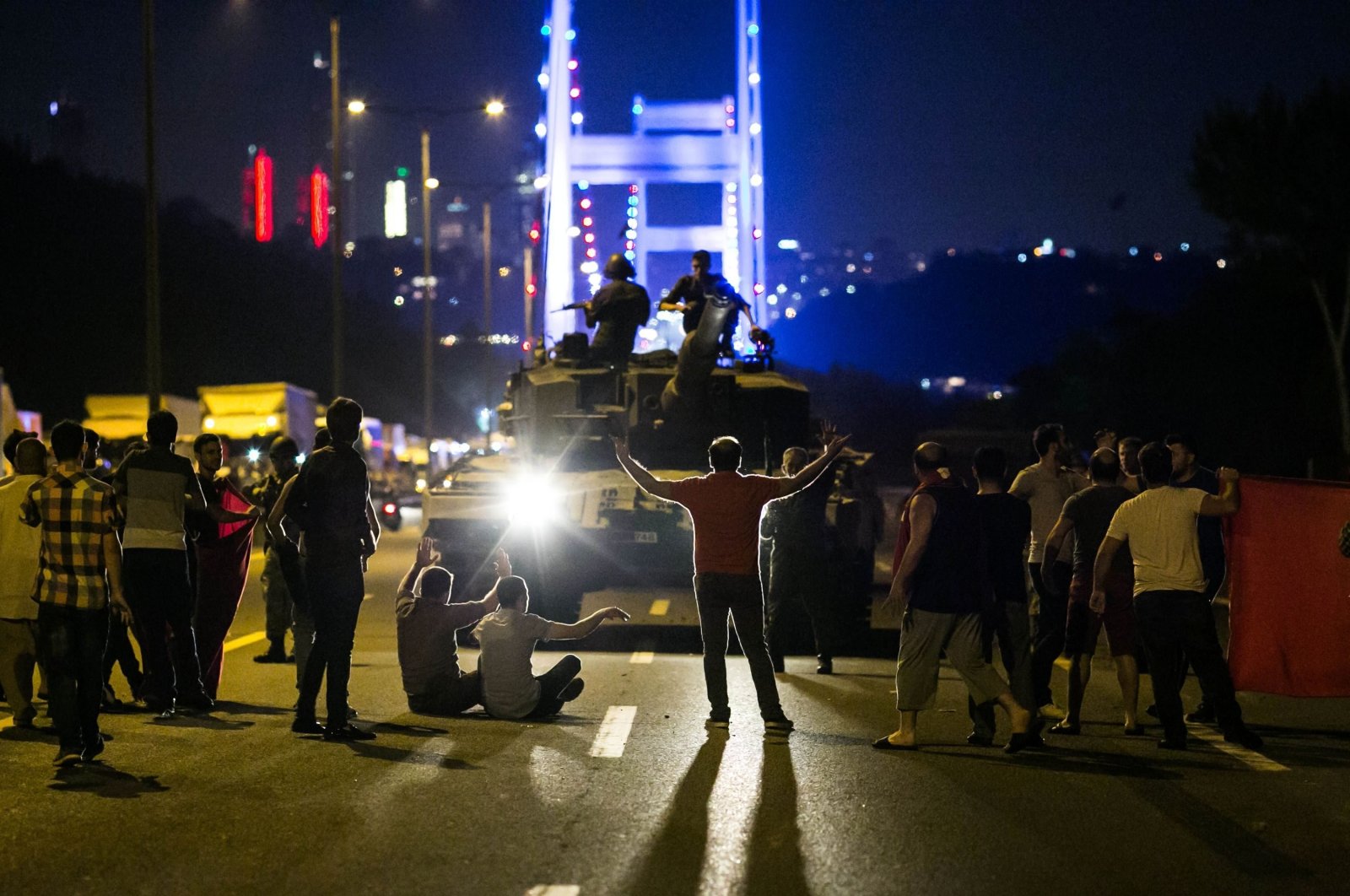People take over a tank hijacked by putschists in Istanbul, Türkiye, July 16, 2016. (AFP Photo)