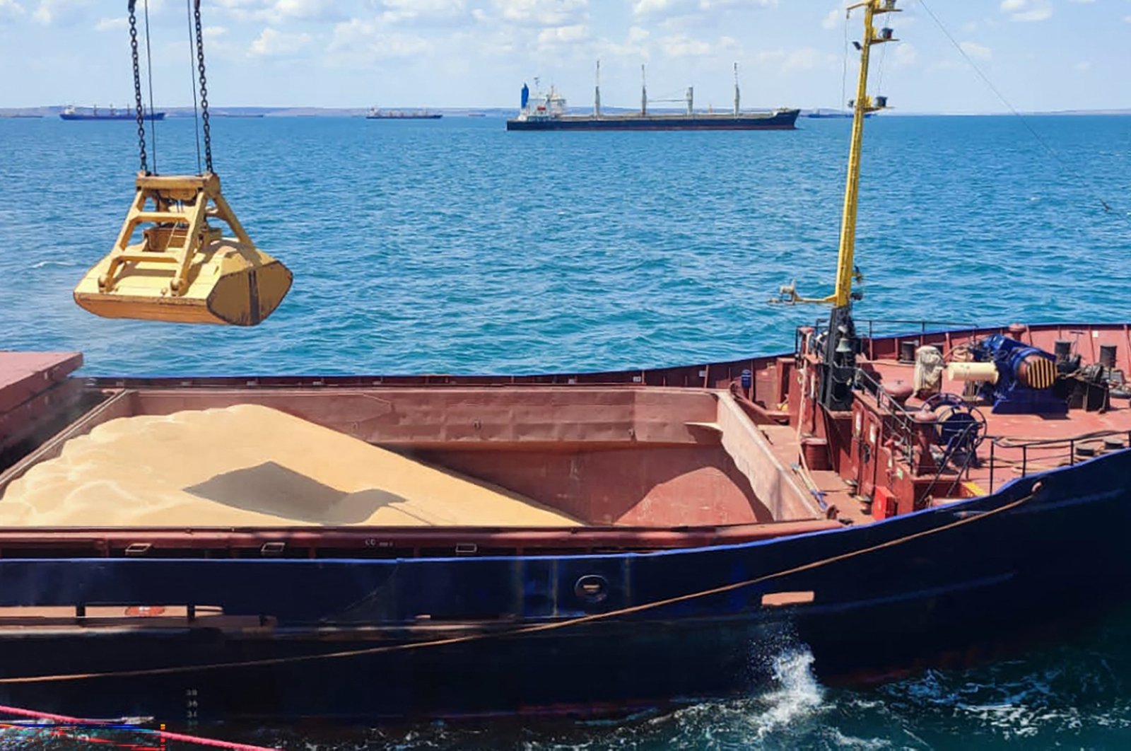 Grain is loaded aboard a cargo ship at the Azov Sea Port, Rostov region, Russia, July 22, 2023. (AFP Photo)