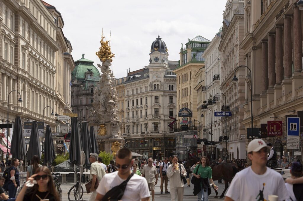 People walk on the shopping street Graben in Vienna, Austria, June 14, 2022. (AP Photo)