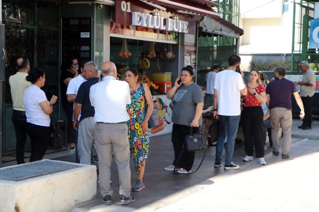 People on the streets following the earthquake, in Adana, southern Türkiye, July 25, 2023. (DHA Photo)