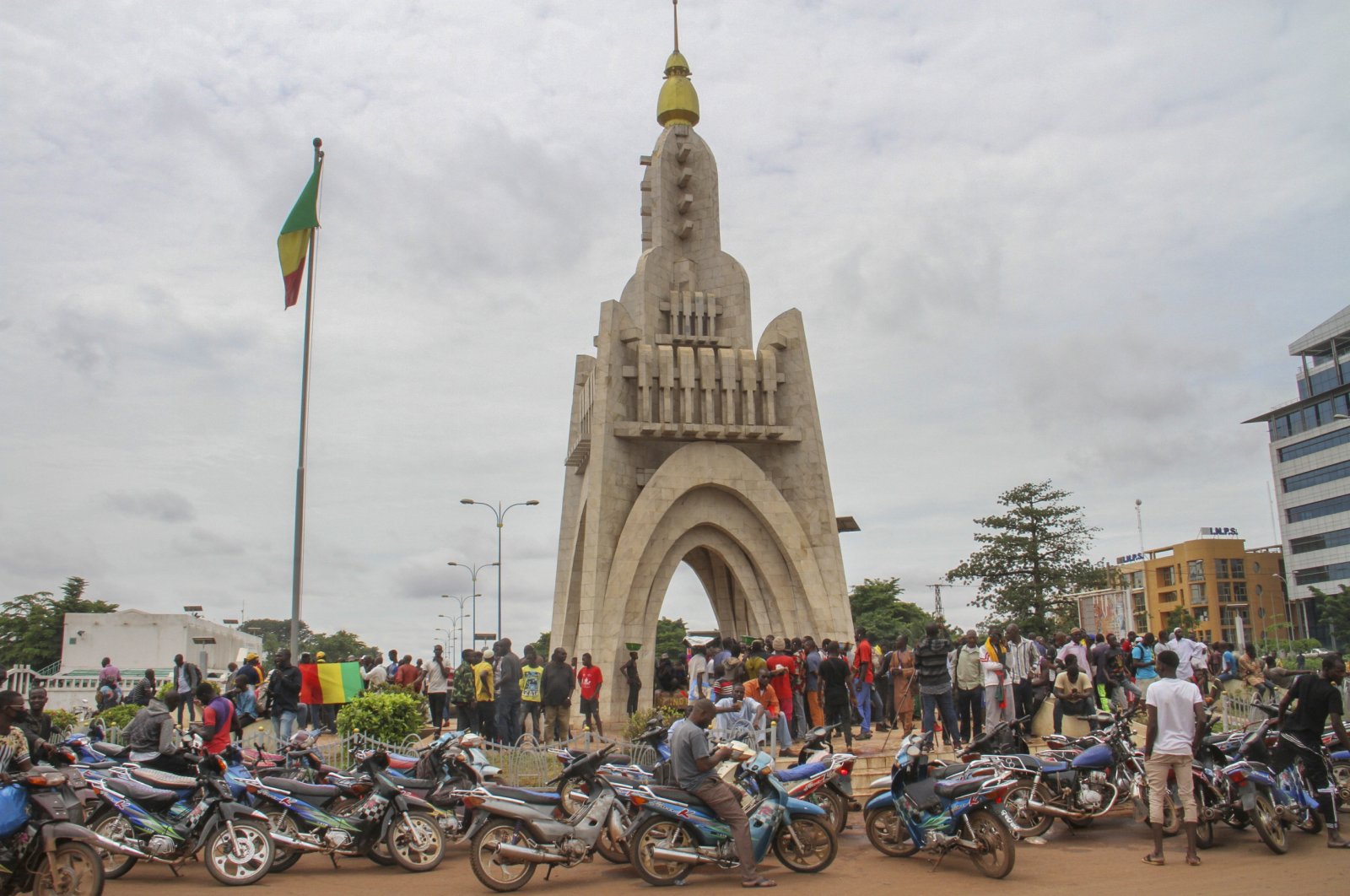 People gather at Place de l'Independence in Bamako, Mali, Aug. 19, 2020. (AP Photo)