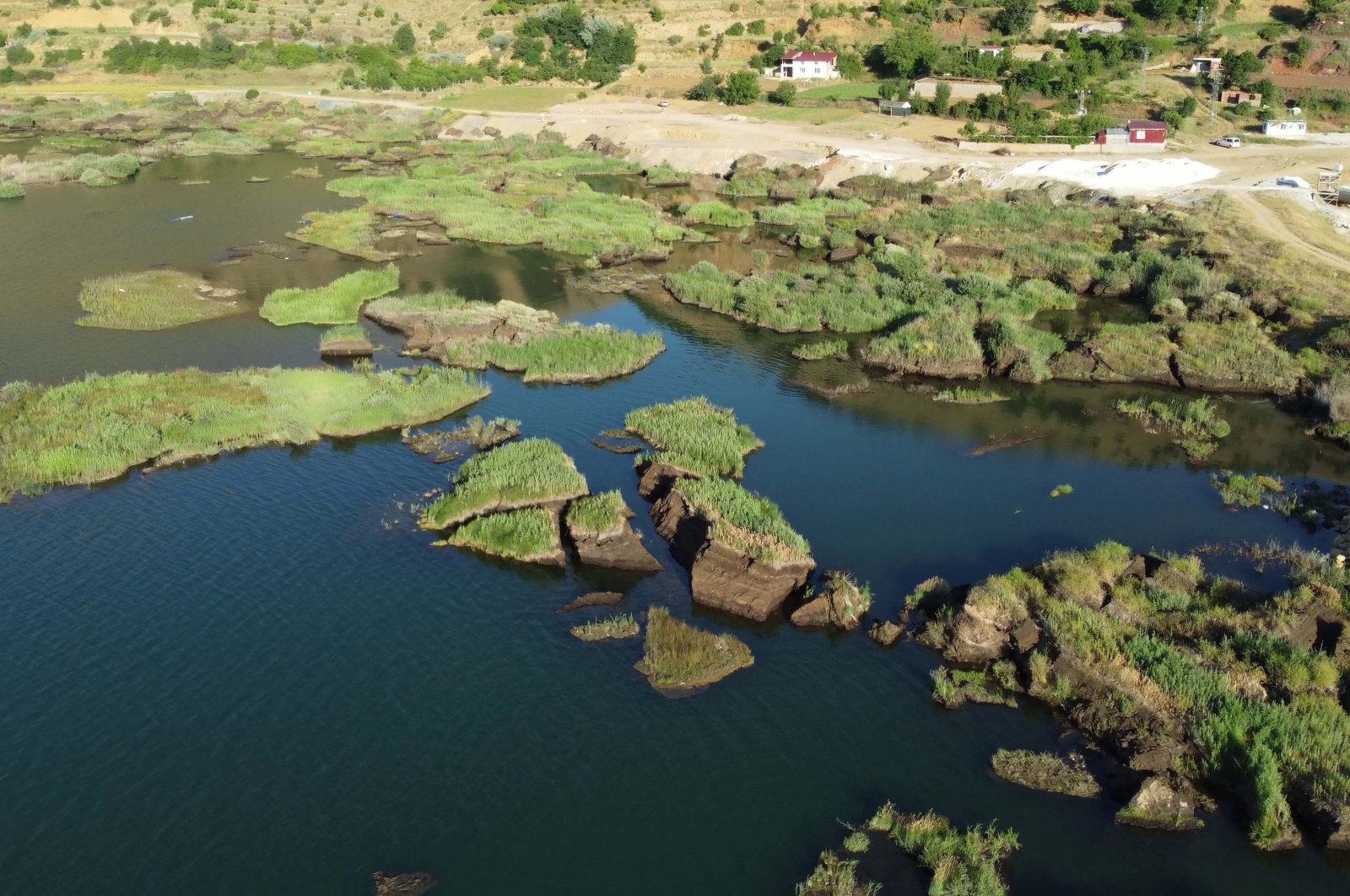 Ancient floating islands are seen in Çat dam lake in Adıyaman, Türkiye, July 26, 2023. (DHA Photo)