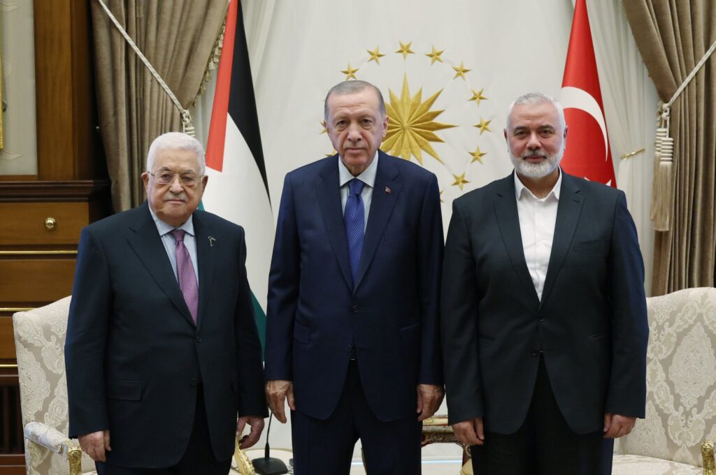 President Recep Tayyip Erdoğan (C) poses with Palestinian President Mahmoud Abbas (L) and Hamas political chief Ismail Haniyeh at the Presidential Complex, in the capital Ankara, Türkiye, July 26, 2023. (AA Photo)