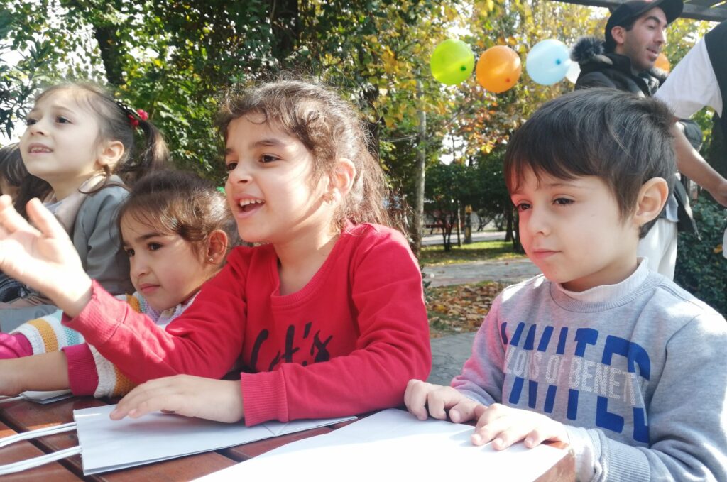 Syrian orphans participate in an activity at a local park in Istanbul, Türkiye, July 27, 2023. (Photo by Sisa Bodani)