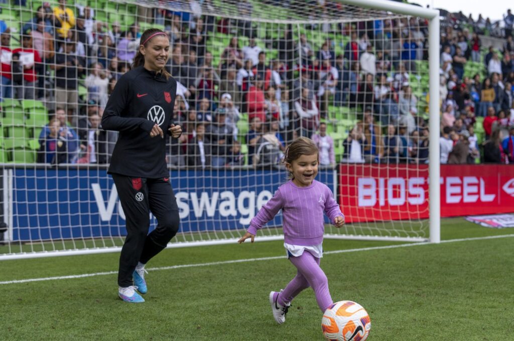 USWNT's Alex Morgan (L) watches her daughter Charlie Carrasco dribble during an international friendly game against Ireland at Q2 Stadium, Texas, U.S., April 8, 2023. (Getty Images Photo)