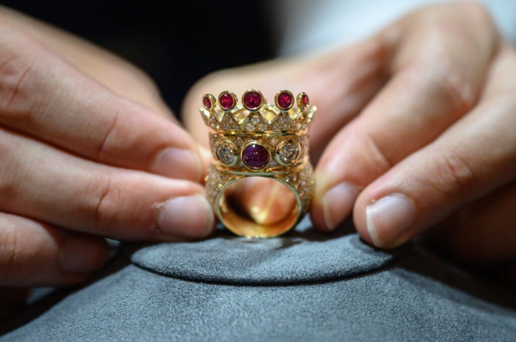A gold, ruby, and diamond crown ring, designed and worn by the late U.S. rapper Tupac Shakur during his last public appearance in 1996, displayed during a press preview at Sotheby's in New York, U.S., July 20, 2023. (AFP Photo)