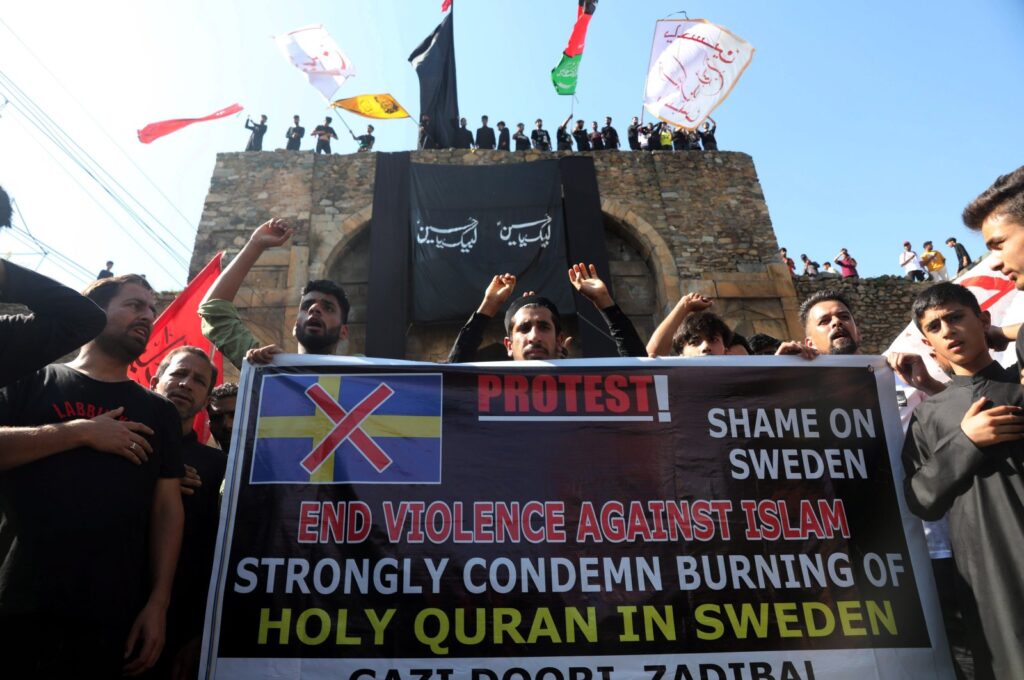 Kashmiri Muslims protest as they take part in a religious procession on the seventh day of the Islamic month of Muharram, in Srinagar, Kashmir, July 26, 2023. (EPA Photo)