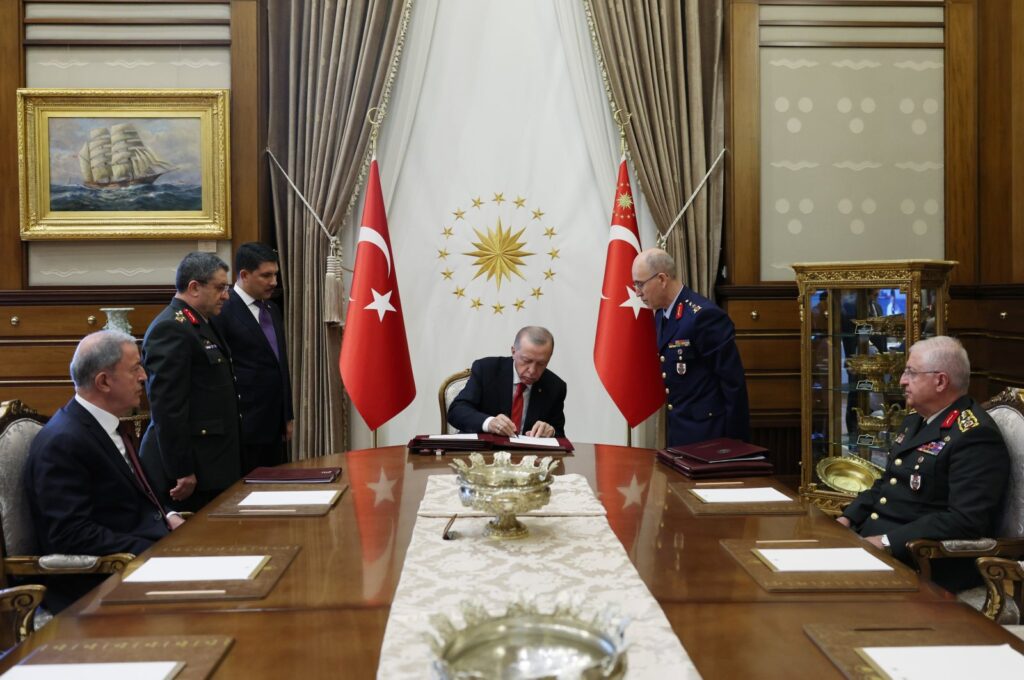 President Recep Tayyip Erdoğan signs the decisions of the Supreme Military Council (YAŞ) in the capital Ankara, Türkiye, Aug. 12, 2022 (AA Photo)