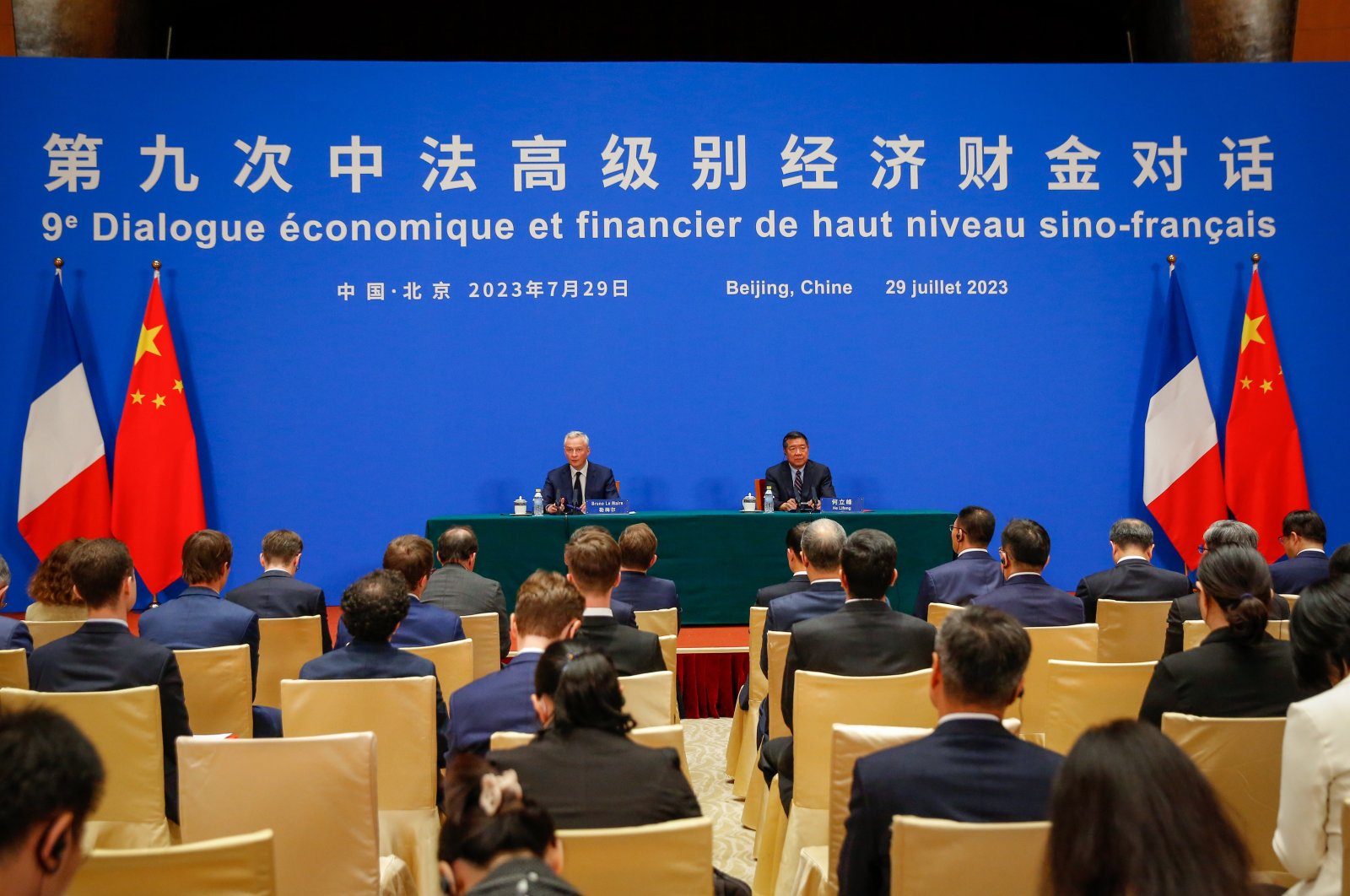 French Finance Minister Bruno Le Maire (C-L) speaks as Chinese Vice Premier He Lifeng (C-R) listens on a translation device during the 9th China-France High-Level Economic and Financial Dialogue at the Diaoyutai State Guest House in Beijing, China, July 29, 2023. (EPA Photo)