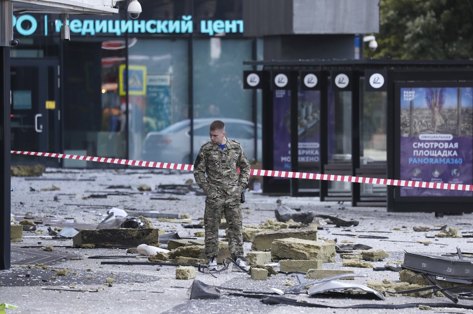 An official inspects debris at the site of a damaged building following a reported drone attack in Moscow, Russia, July 30, 2023. (EPA Photo)