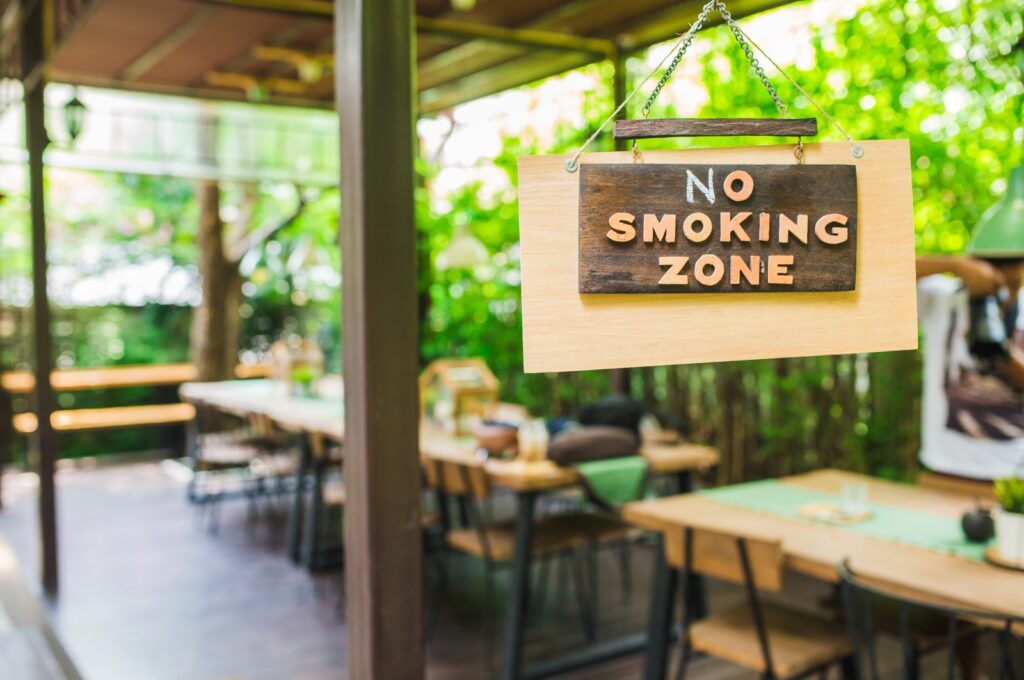 A "No Smoking Zone" sign is hung in an open-door meeting area, July 31, 2023. (Shutterstock Photo)