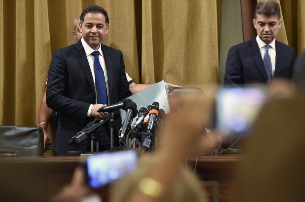 Wassim Mansouri (L), first deputy governor of Lebanon's central bank, arrives at a news conference in Beirut, Lebanon, July 31, 2023. (EPA Photo)