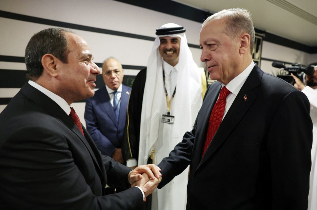 President Recep Tayyip Erdoğan shakes hands with his Egyptian counterpart Abdel-Fattah el-Sissi on the sidelines of the World Cup in Doha, Qatar, Nov. 20, 2022. (Reuters Photo)