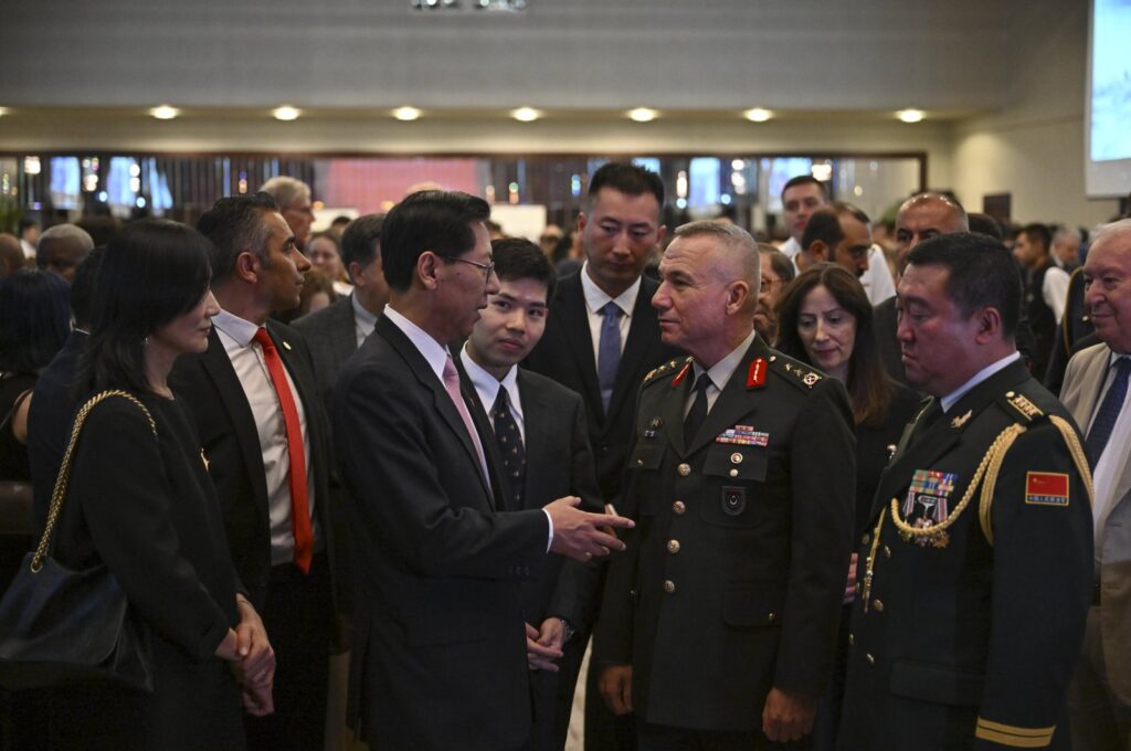 Maj. Gen. Gültekin Yaralı (R) speaks with Liu Shaobin, China's ambassador to Ankara, at a reception in the capital, Türkiye, July 31, 2023 (AA Photo)
