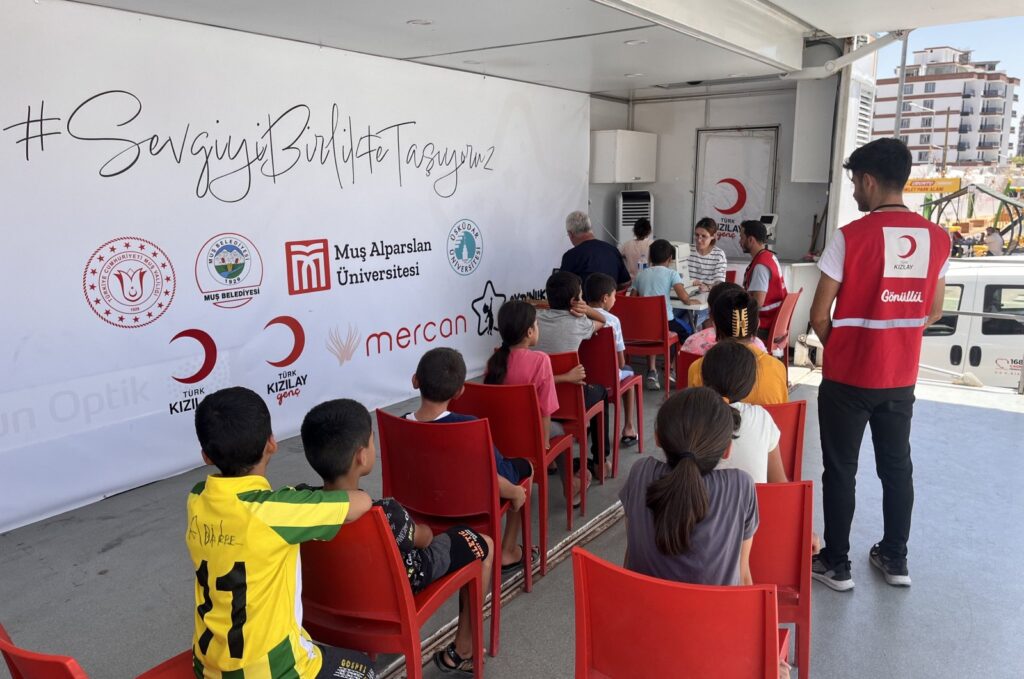 Children wait for eye screening in Muş, eastern Türkiye, Aug. 1, 2023. (AA Photo)