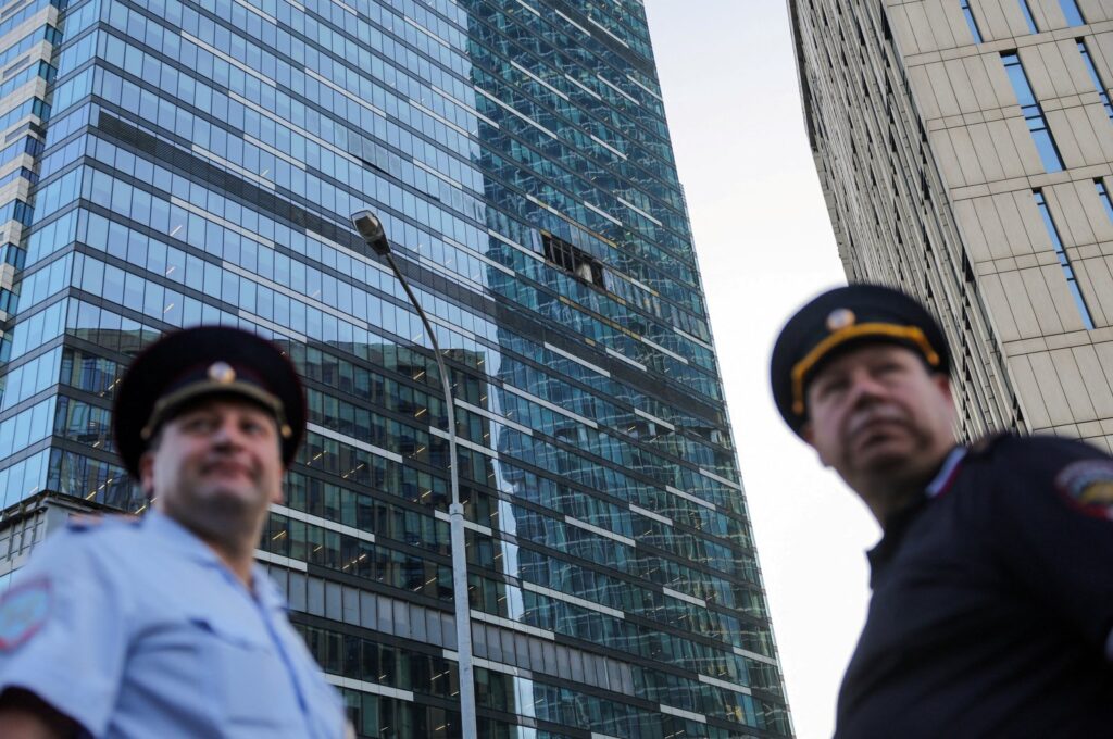 Emergency personnel work near a damaged office building in the Moscow City business district, Moscow, Russia, Aug. 1, 2023. (Reuters Photo)