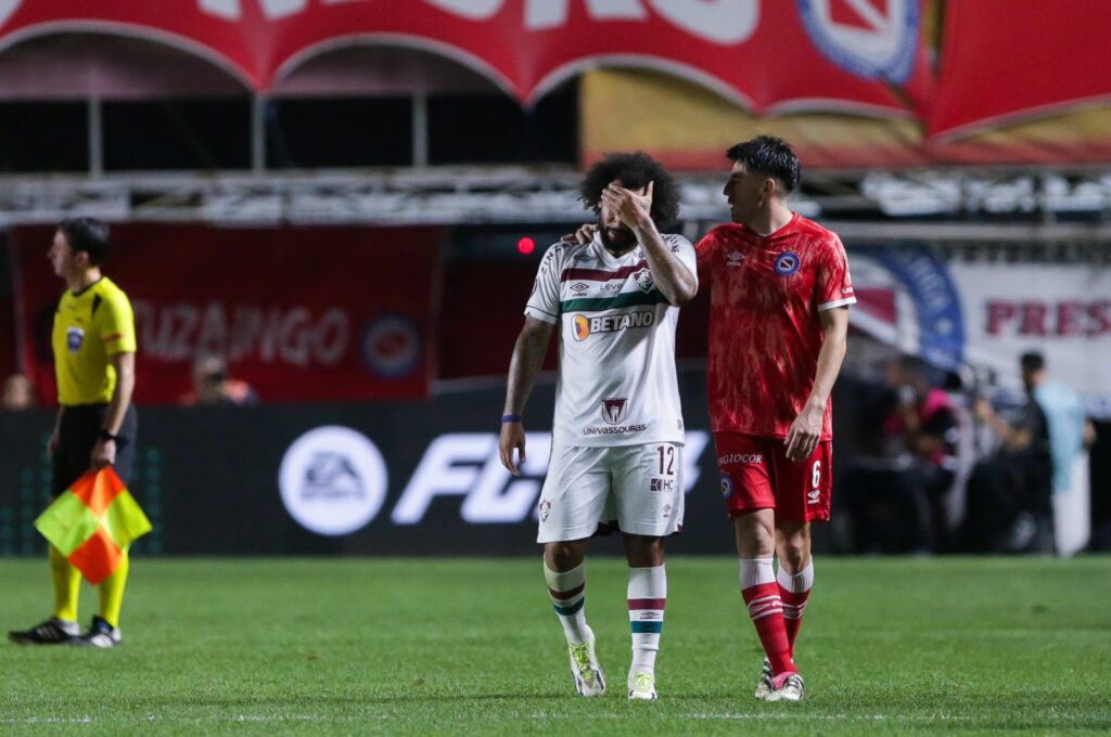 Fluminense's Marcelo (L) cries after the injury of Luciano Sanchez of Argentinos Juniors (not in frame) during the Copa CONMEBOL Libertadores round of 16 match between Argentinos Juniors and Fluminense at Diego Maradona Stadium, Buenos Aires, Aug. 1, 2023. (Getty Images Photo)