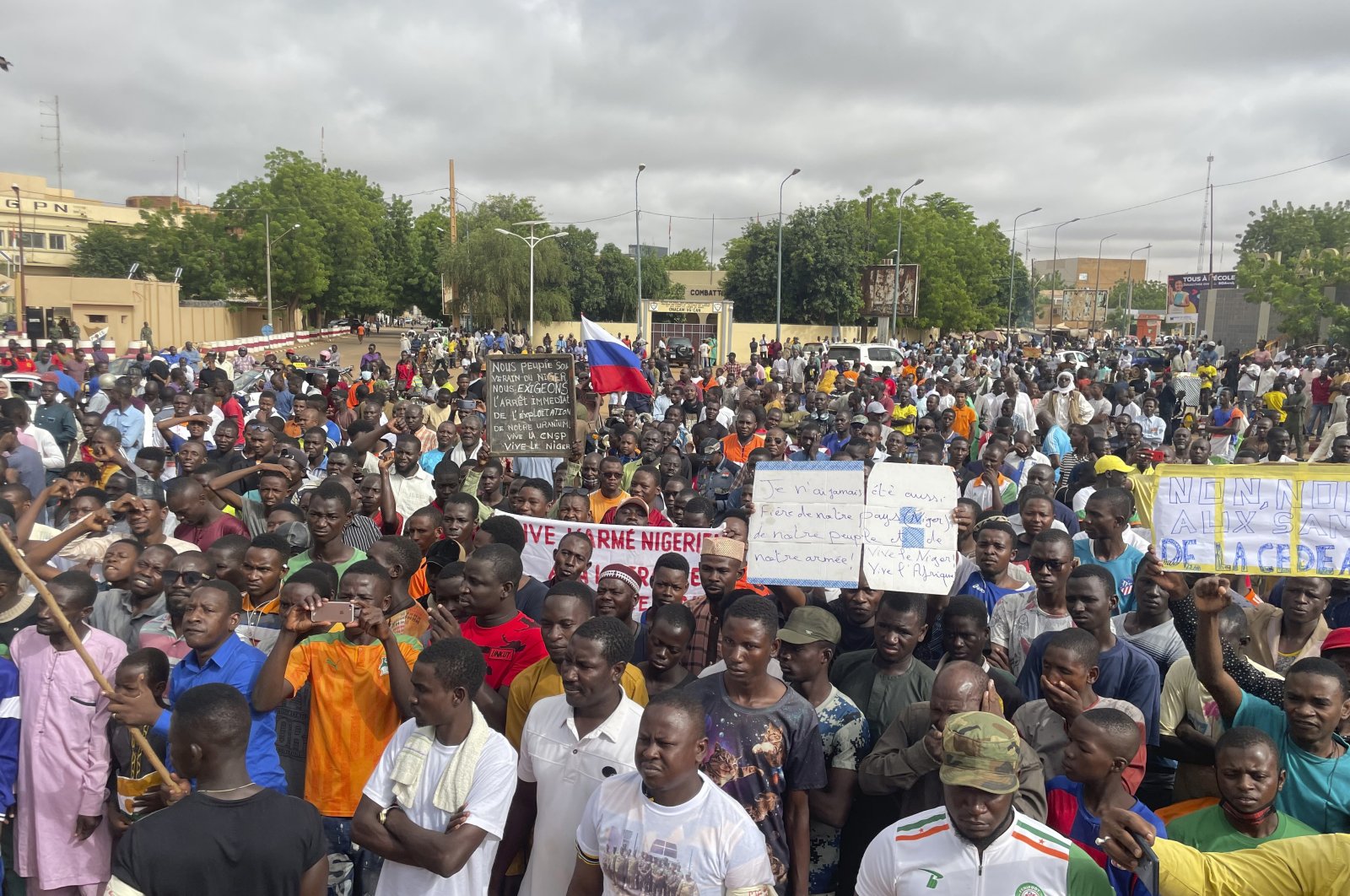 Supporters of Niger's ruling junta, gather for a protest called to fight for the country's freedom and push back against foreign interference, in Niamey, Niger, Thursday, Aug. 3, 2023. (AP Photo)