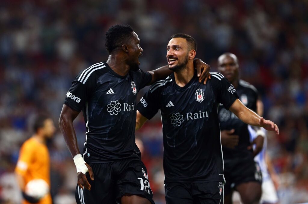 Beşiktaş players Daniel Amartey and Onur Bulut celebrate a goal against Albania's Tirana at Air Albania Stadium, Tirana, Albania, Aug. 3, 2023. (DHA Photo)