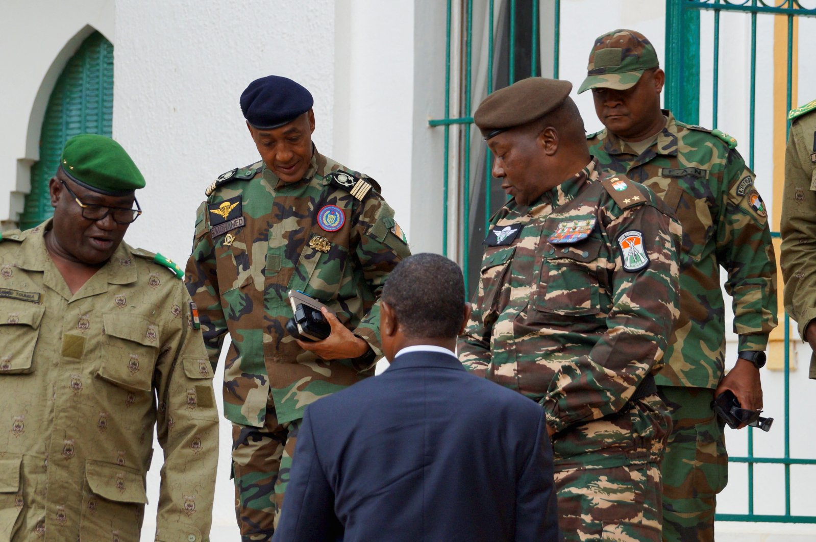 Gen. Abdourahmane Tiani (2nd R), who was declared the new head of state of Niger by leaders of a coup, arrives to meet with ministers, Niamey, Niger July 28, 2023. (Reuters Photo)