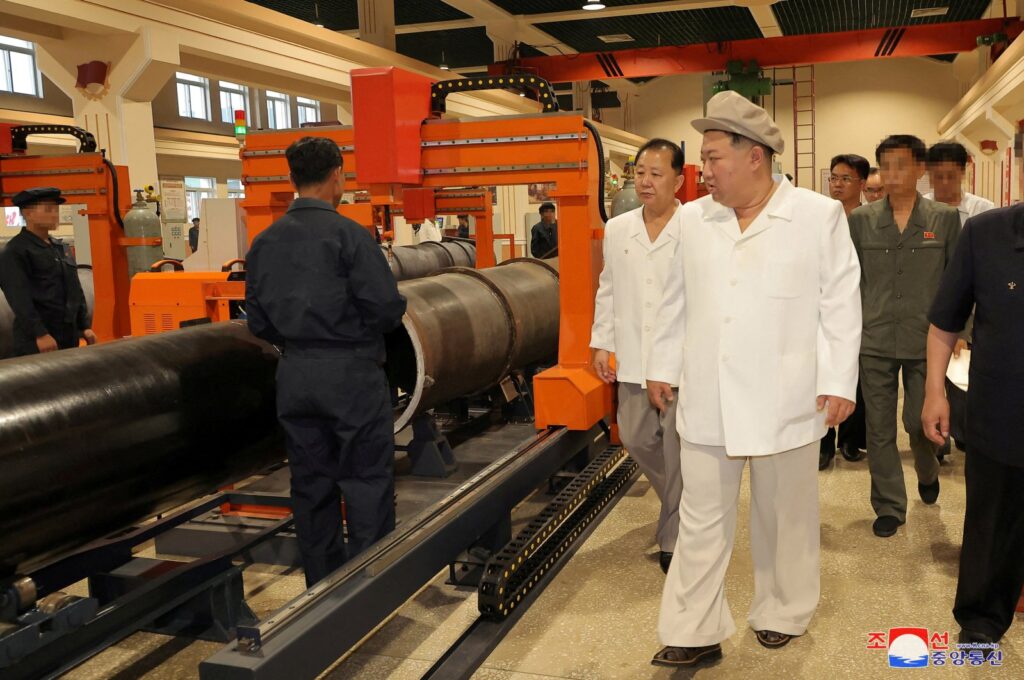 North Korean leader Kim Jong Un gives field guidance at a major weapon factory at an undisclosed location, North Korea, Aug. 3, 2023. (Reuters Photo) 