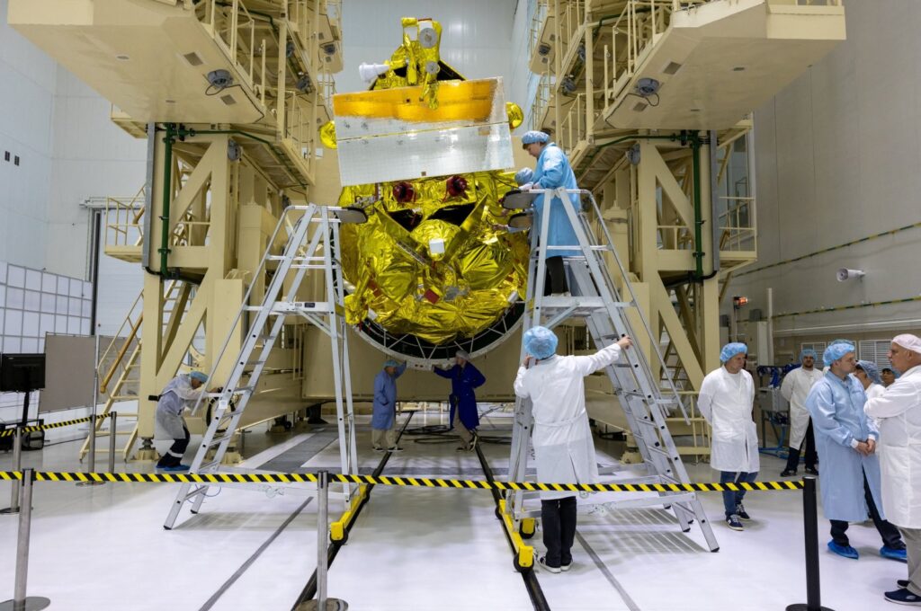 Specialists take part in preparations ahead of the launch of the lunar landing spacecraft Luna-25 mission to search for ice near the south pole of the moon, at the Vostochny Cosmodrome in the Amur region, Russia, in this handout photo published Aug. 1, 2023. (Reuters Photo)