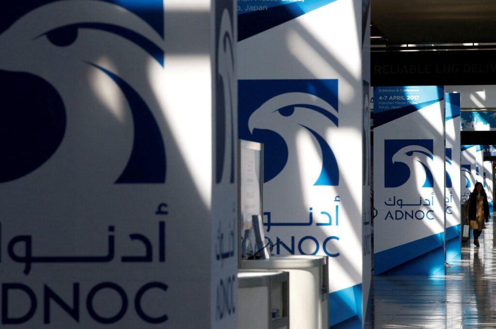 Logos of ADNOC at Gastech, the world's biggest expo for the gas industry, in Chiba, Japan, April 4, 2017. (Reuters Photo)