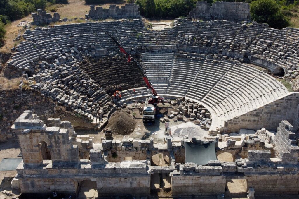 An aerial view shows the restoration works in Tlos' ancient theater, in the Seydikemer district, Muğla, southwestern Türkiye, Aug. 11, 2023. (AA Photo)