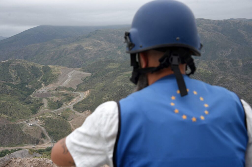 A European Union observer looks in the direction of a checkpoint at the entry of the Lachin corridor, in Karabakh, Azerbaijan, July 30, 2023. (AFP Photo)
