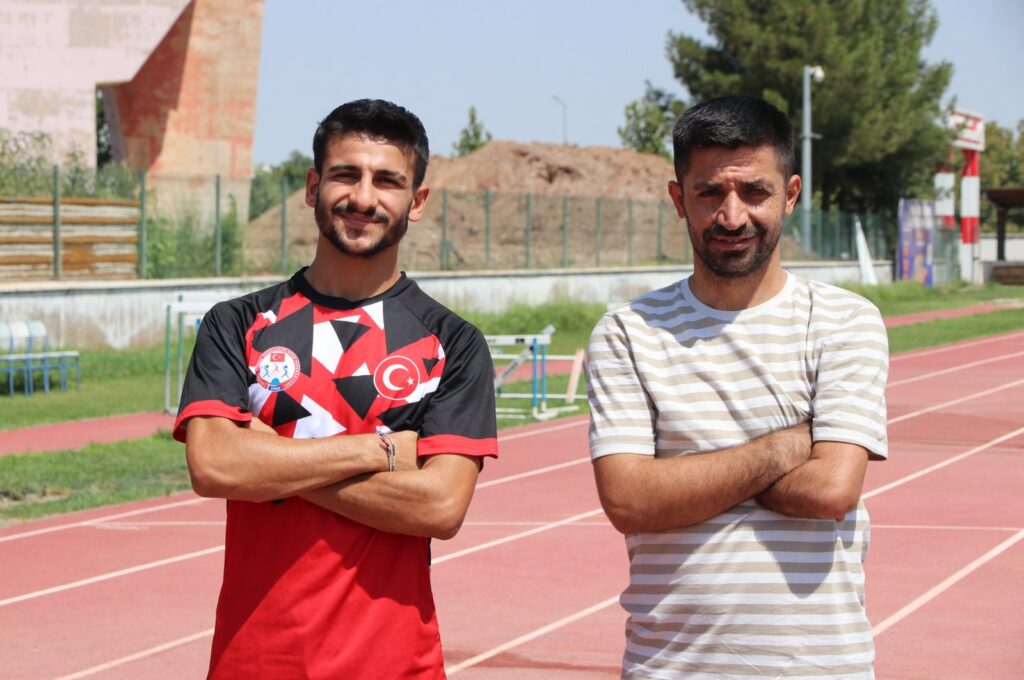 Şırnak's athlete Mikail Al (R) poses for a photo after training for the 2024 Paris Paralympic Games, Şırnak, Türkiye, Aug. 11, 2023. (AA Photo)