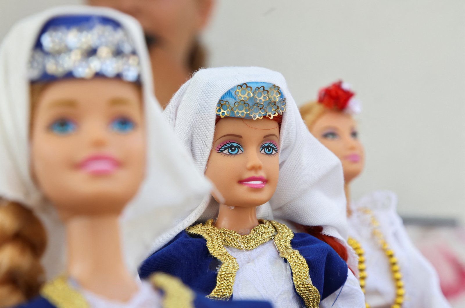 Dolls are displayed dressed in Bosnia's traditional folklore costumes made by 11-year-old Bosnian girl Esma Gljiva, who hopes that her folklore Barbie will reach many, as the frenzy surrounding the launch of the "Barbie" movie spreads across the world, Sarajevo, Bosnia and Herzegovina, Aug. 15, 2023. (Reuters Photo)