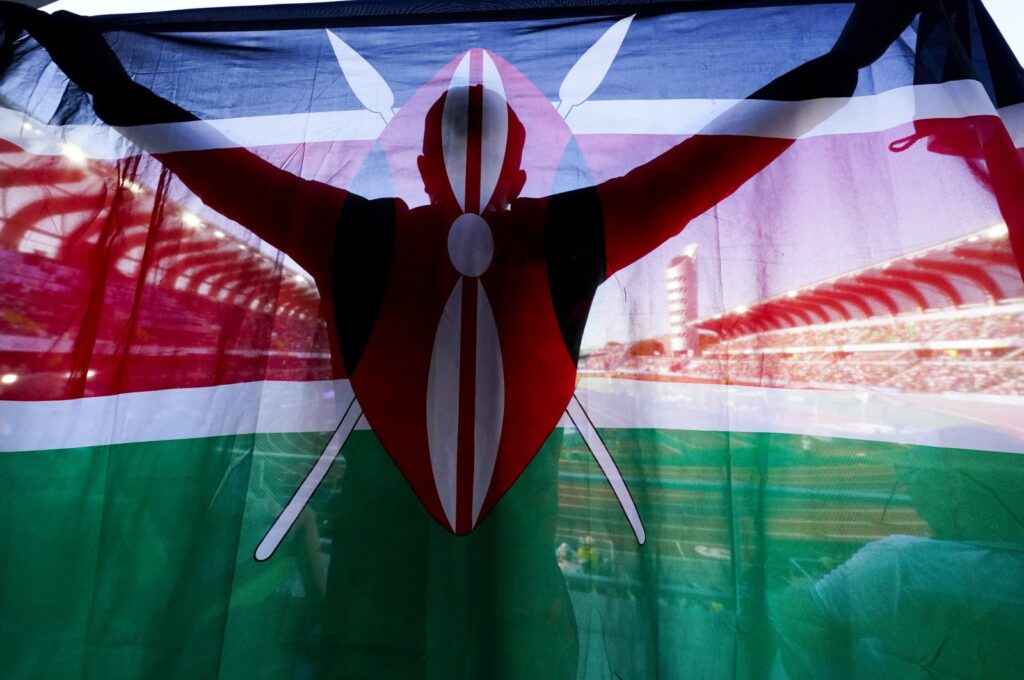 A fan of Kenya holds up a national flag during the final in the women's 5,000-meter run at the World Athletics Championships, Oregon, U.S., July 23, 2022. (AP Photo)