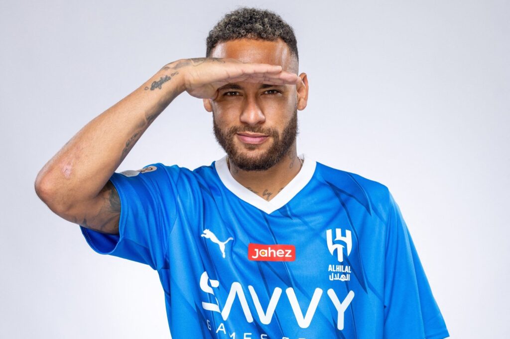 Brazilian forward Neymar poses for a picture in the team's uniform during a signing ceremony, Paris, France, Aug. 15, 2023. (AFP Photo)