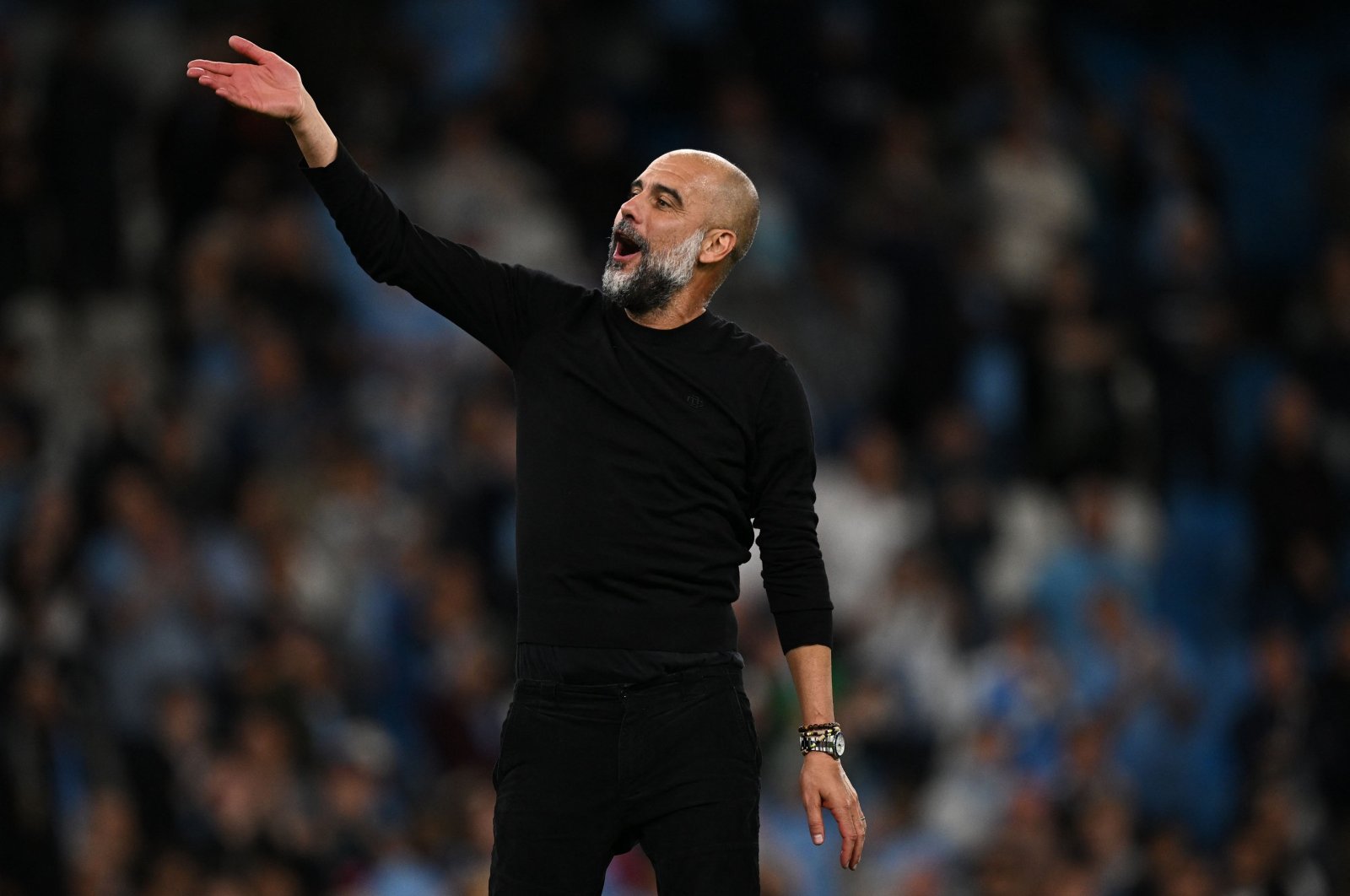 Manchester City's manager Pep Guardiola celebrates at the end of the English Premier League football match between Manchester City and Newcastle United at the Etihad Stadium, Manchester, U.K., Aug. 19, 2023. (AFP Photo)