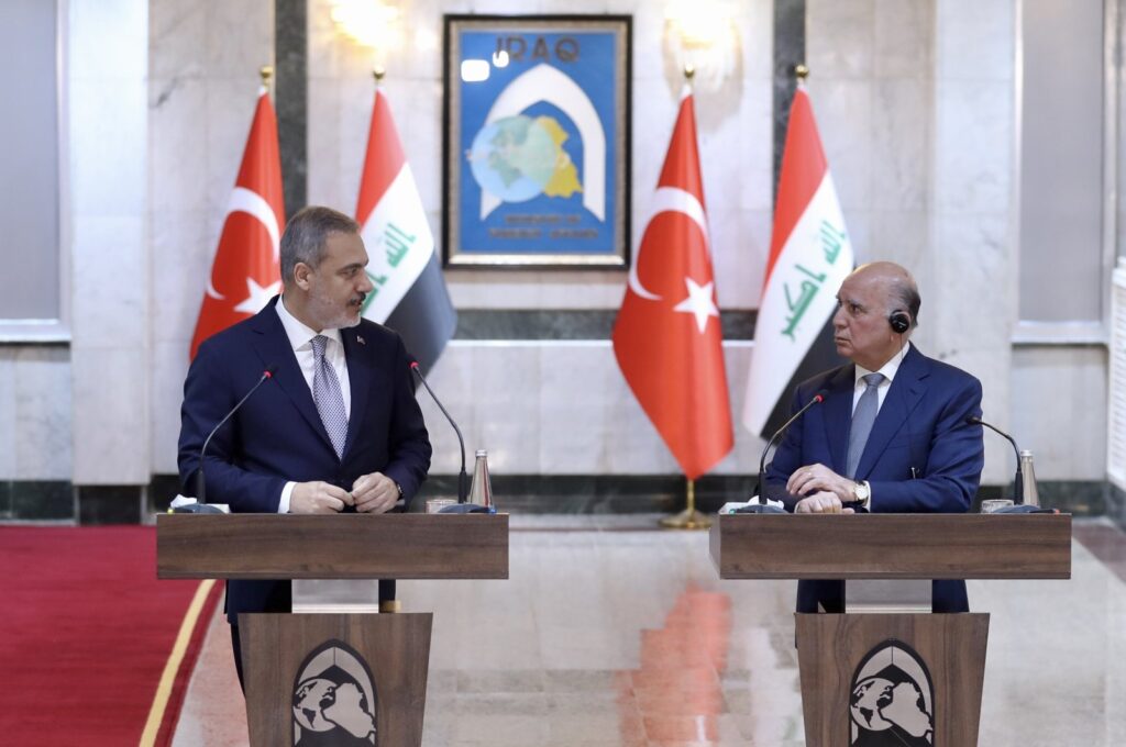 Foreign Minister Hakan Fidan (L) speaks at a news conference with Iraqi Foreign Minister Fuad Hussein, Baghdad, Iraq, Aug. 22, 2023. (AA Photo)