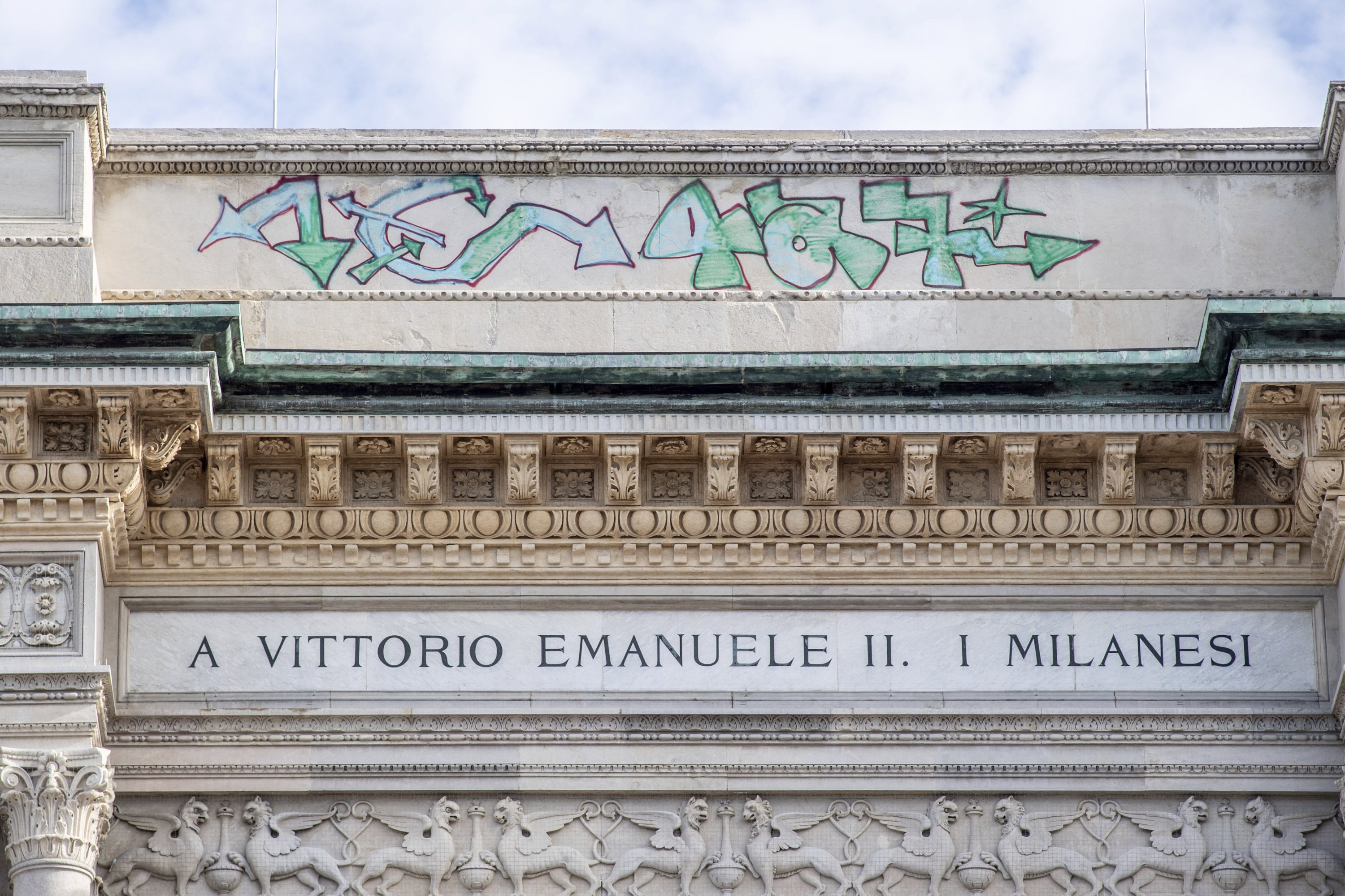 288852 Graffiti is seen on the facade of the Vittorio Emanuele Arcade in Milan, Italy, Aug. 8, 2023. (AP Photo)
