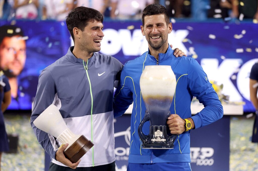 Spain's Carlos Alcaraz (L) and Serbia's Novak Djokovic pose with their trophies after the final of the Western & Southern Open at Lindner Family Tennis Center, Ohio, US., Aug. 20, 2023. (AFP Photo)