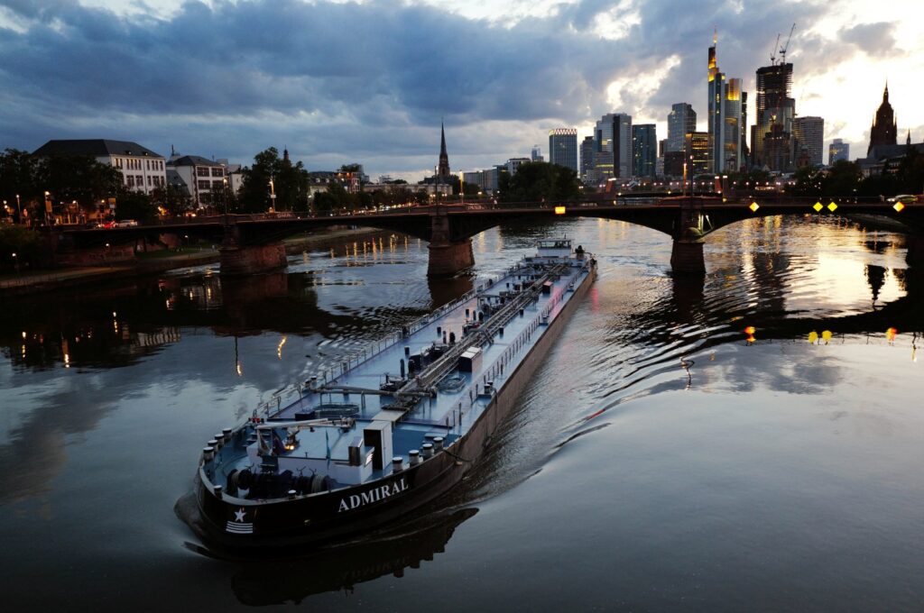 A cargo ship is seen on the River Main on a summer evening in Frankfurt, Germany, Aug. 13, 2023. (Reuters Photo)