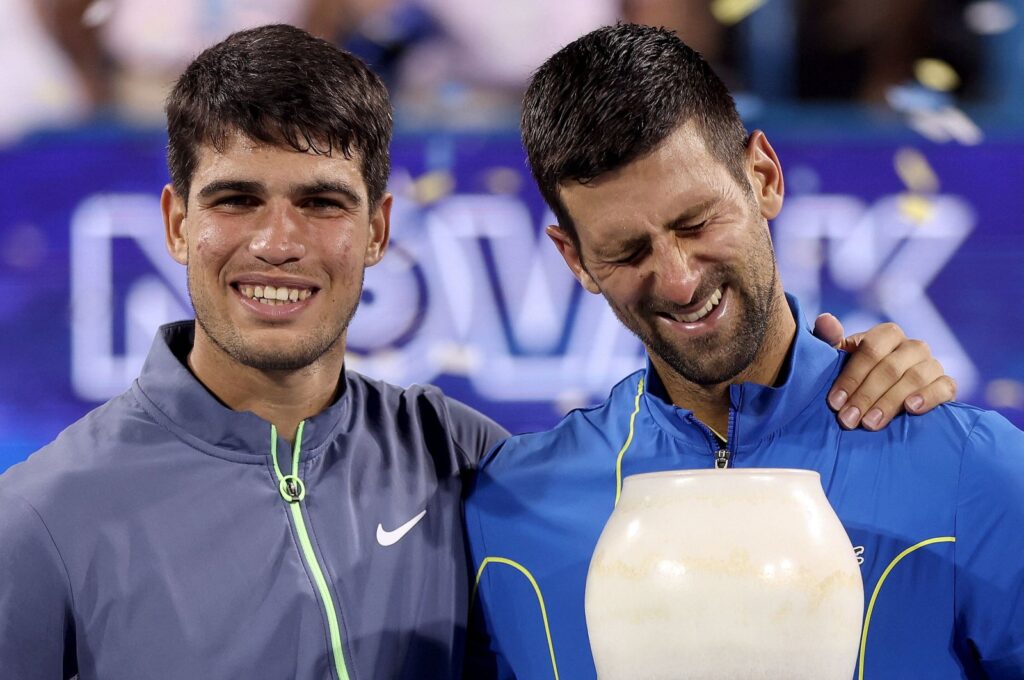 Spain's Carlos Alcaraz and Serbia's Novak Djokovic pose with their trophies after the Cincinnati Open, Mason, Ohio, U.S., Aug. 20, 2023. (AFP Photo)