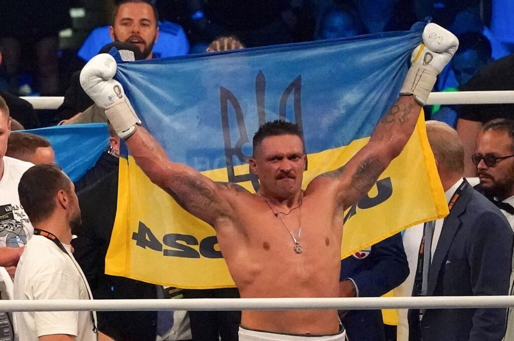 Ukraine's reigning world heavyweight champion Oleksandr Usyk celebrates winning his fight against challenger Daniel Dubois of Great Britain in Wroclaw, Poland, Aug. 26, 2023. (AFP Photo)