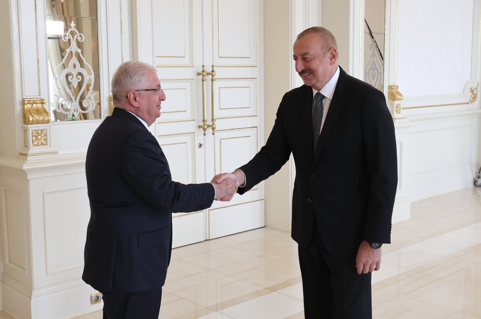 Azerbaijani President Ilham Aliyev receives Turkish National Defense Minister Yaşar Güler at the Zagulba Presidential Residence in Baku, Azerbaijan, Aug. 27, 2023. (AA Photo)