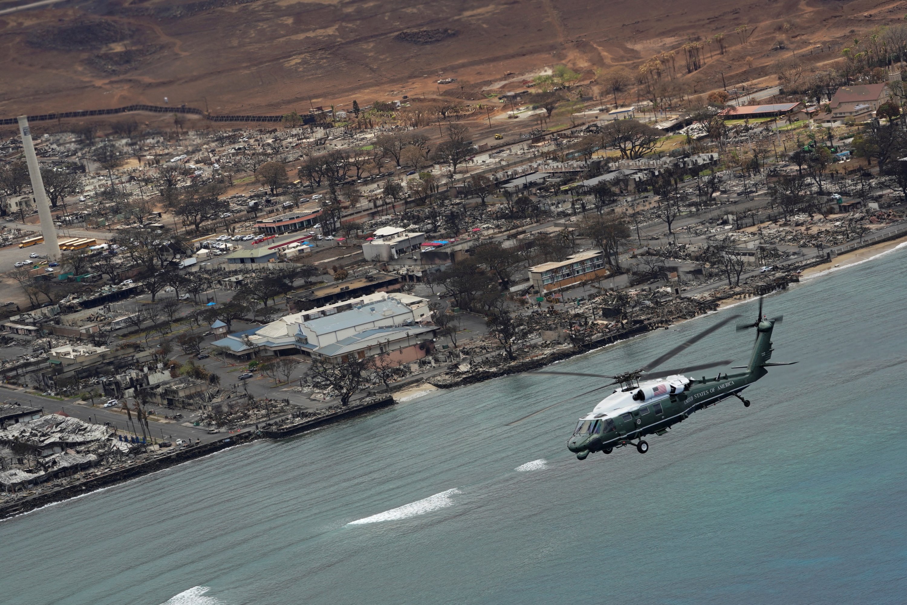 289357 U.S. President Joe Biden, aboard Marine One, inspects the fire-ravaged town of Lahaina on the island of Maui in Hawaii, U.S., Aug. 21, 2023. (Reuters Photo)
