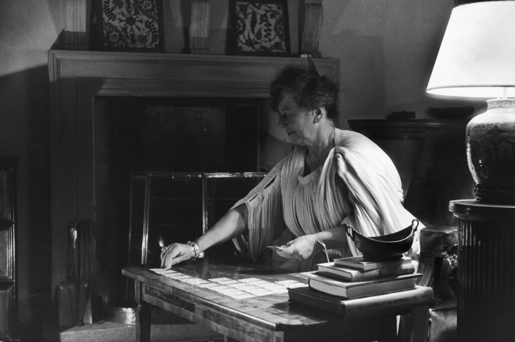 British explorer and writer Freya Stark, playing solitaire at her home in Asola, Italy, May 1957. (Getty Images Photo)