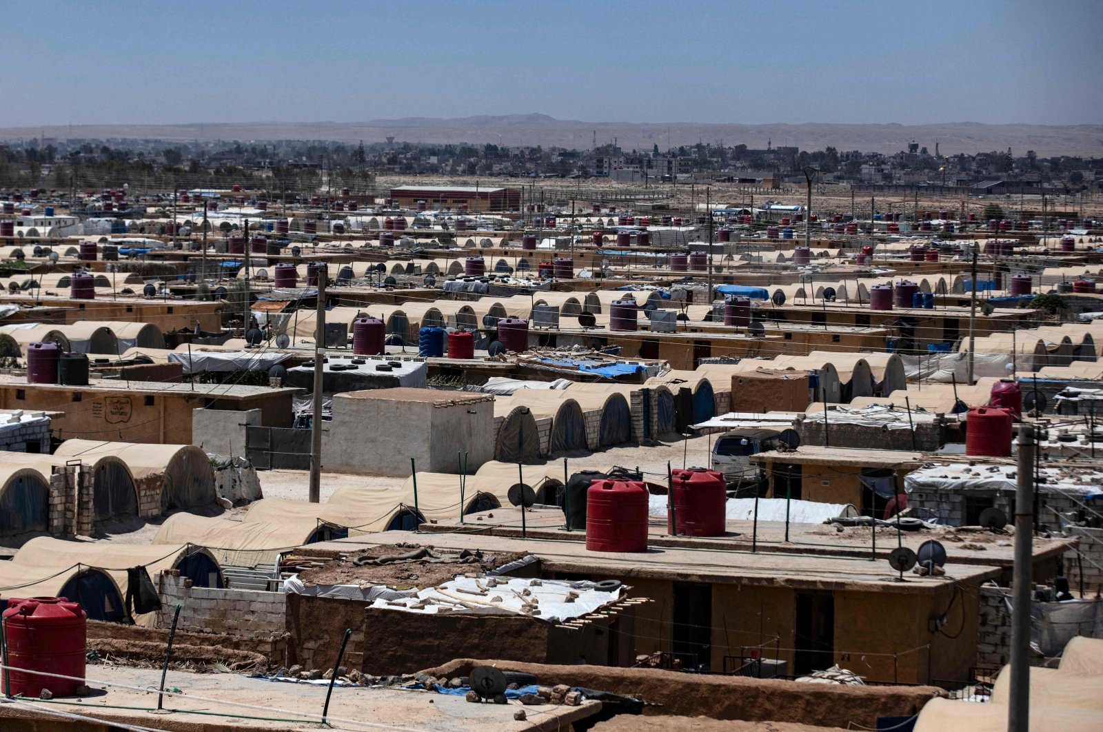 A view of the al-Talaeh makeshift camp where thousands of people displaced by 12 years of war are languishing in extreme poverty, largely cut off from international assistance, in Syria's northeastern Hasakeh province, on July 13, 2023. (AFP Photo)