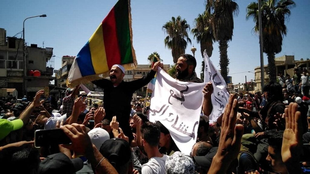 People protest against the Syrian government in Sweida, Syria, Aug. 24, 2023. (Reuters Photo)