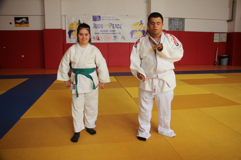 Turkish judokas with Down syndrome Muhammed Demirbaş (R) and Sibel Yıldırım pose for a photo after training, Kilis, Türkiye, Aug. 16, 2023 (AA Photo)