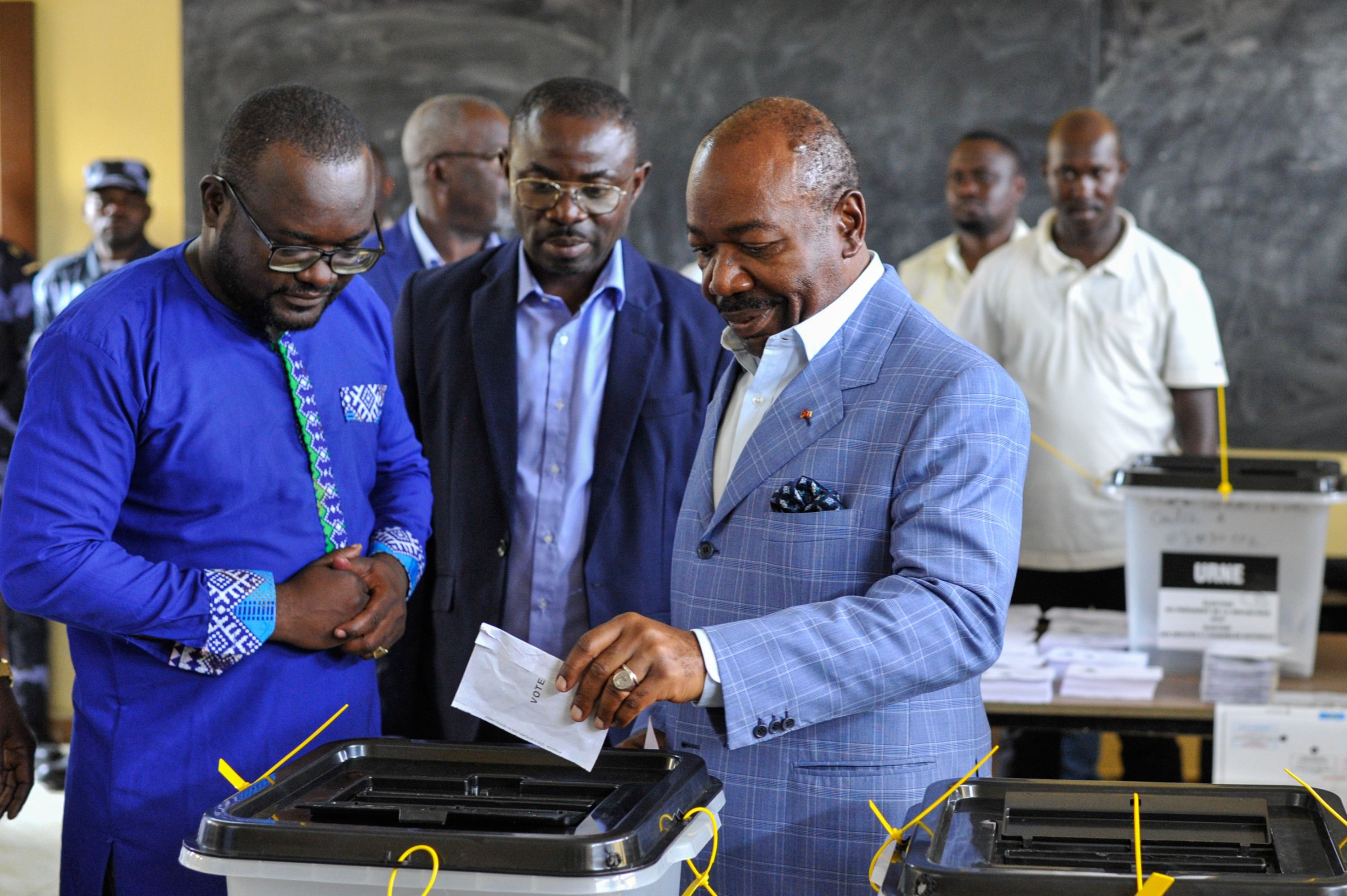 289712-1 Gabonese President Ali Bongo Ondimba (R), casts his vote during the 2023 Gabonese general elections in Libreville, Gabon, Aug. 26, 2023. (EPA Photo)