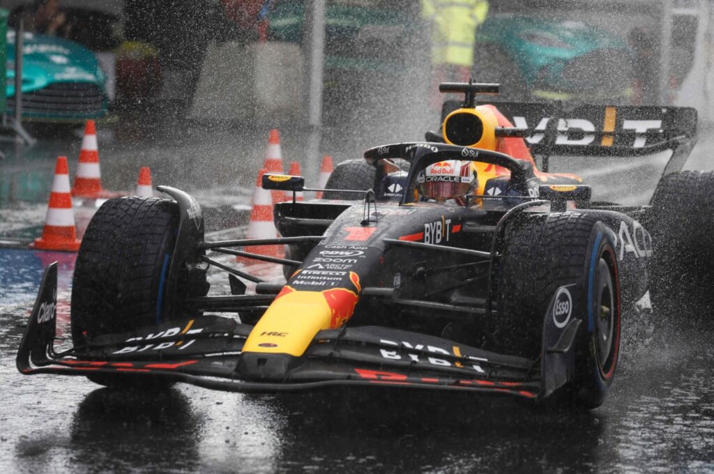 Red Bull Racing's Dutch driver Max Verstappen drives to the pit under the rain as the race is stopped during the Dutch Formula One Grand Prix race at The Circuit Zandvoort, Zandvoort, Netherlands, Aug. 27, 2023. (AFP Photo)