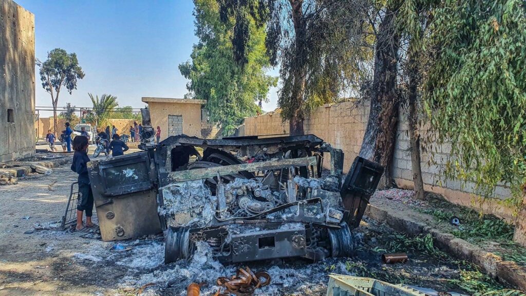 Debris of a charred vehicle after clashes in Deir el-Zour, Syria, Sept. 2, 2023. (İHA Photo)